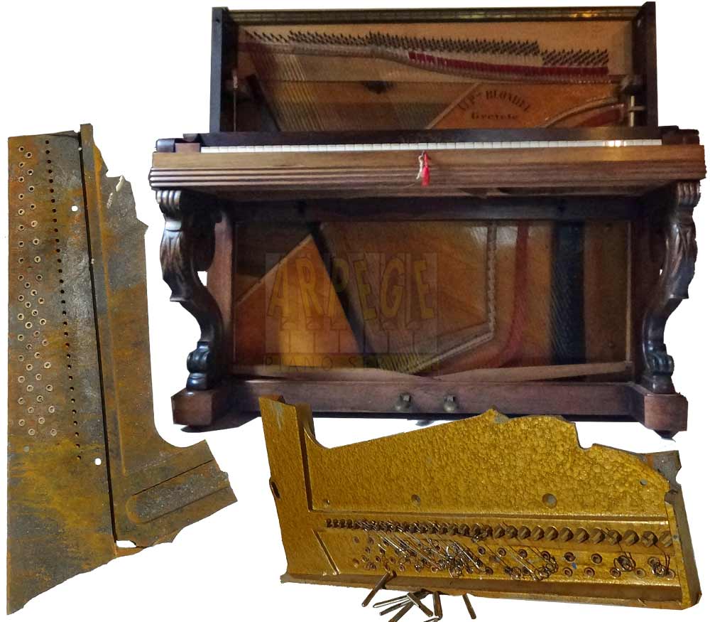 Piano droit dit cadre bois, fréquemment tenue d'accord éphémère. Cadre fonte, sous la fonte le sommier, les chevalets et la table d’harmonie en bois